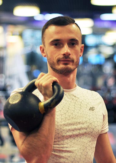 Trener personalny Tomasz Maliński